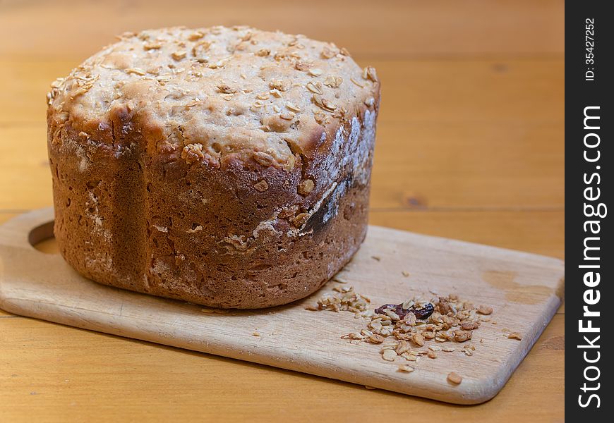Home made bread with muesli on desk. shallow dof