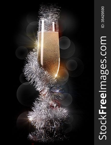 Glass of champagne with beautiful Christmas decorations. Glass of champagne with beautiful Christmas decorations