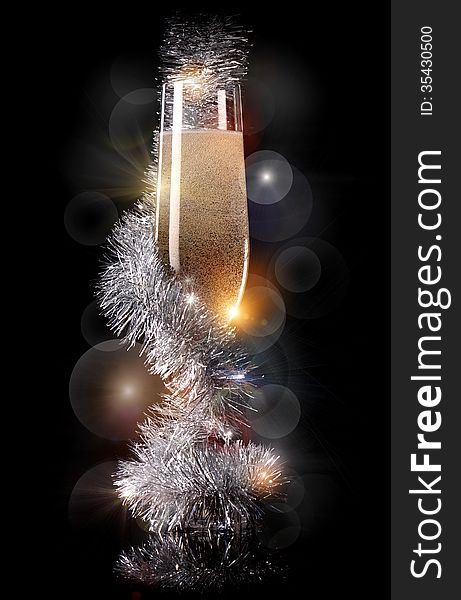 Glass of champagne with beautiful Christmas decorations. Glass of champagne with beautiful Christmas decorations