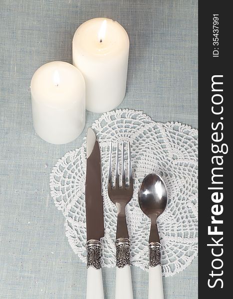 Christmas decorations and tableware with white candle