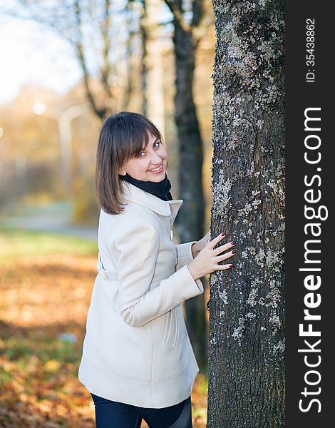 Beautiful girl in autumn Park