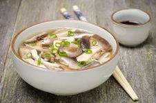 Chinese Food - Bowl Of Soup With Chicken, Shiitake Mushrooms Royalty Free Stock Images