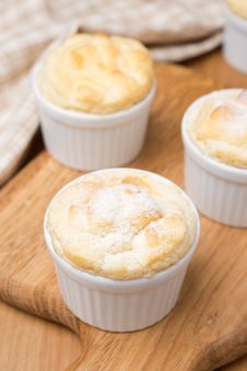 Peach Souffle In The Portioned Form On A Wooden Board, Vertical Stock Photo Peach Souffle In The Portioned Form On A Wooden Board, Vertical Stock Photo