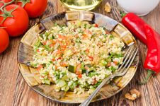 Salad With Bulgur, Zucchini, Tomatoes, Parsley On The Plate Royalty Free Stock Photography Salad With Bulgur, Zucchini, Tomatoes, Parsley On The Plate Royalty Free Stock Photography
