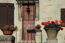 The Wall Of The House Decorated With Flowers, France Royalty Free Stock Photo The Wall Of The House Decorated With Flowers, France Royalty Free Stock Photo