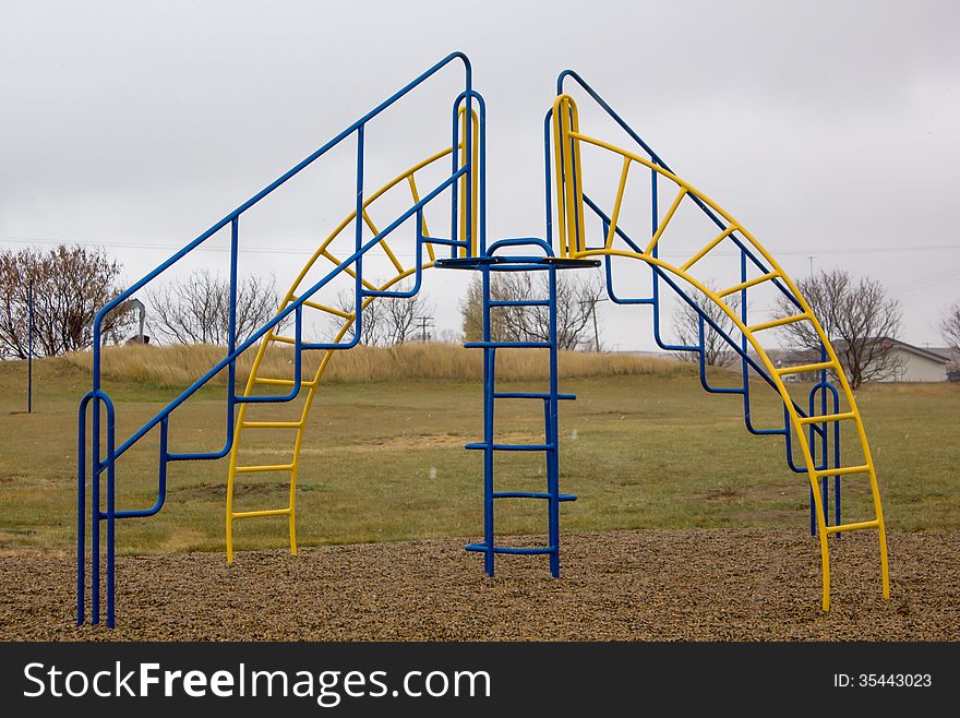 Blue and yellow steel play structure. Blue and yellow steel play structure