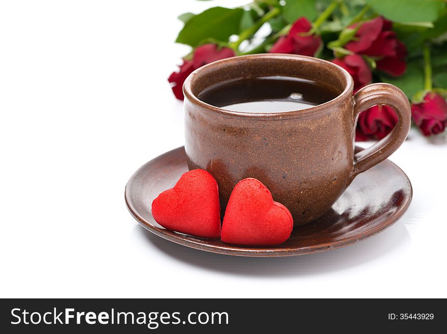 Cup of coffee, red candy, gift and roses for Valentine's Day, isolated on white. Cup of coffee, red candy, gift and roses for Valentine's Day, isolated on white