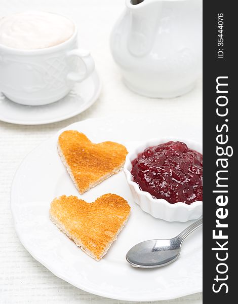 Toasted Bread In The Shape Of Heart With Berry Jam And Coffee