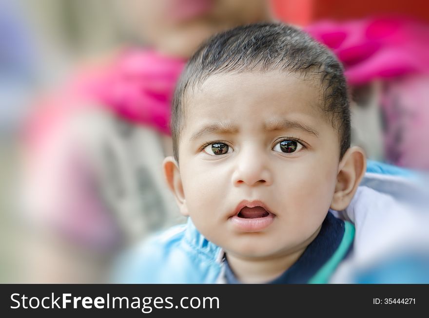 Portrait of cute baby boy looking at camera