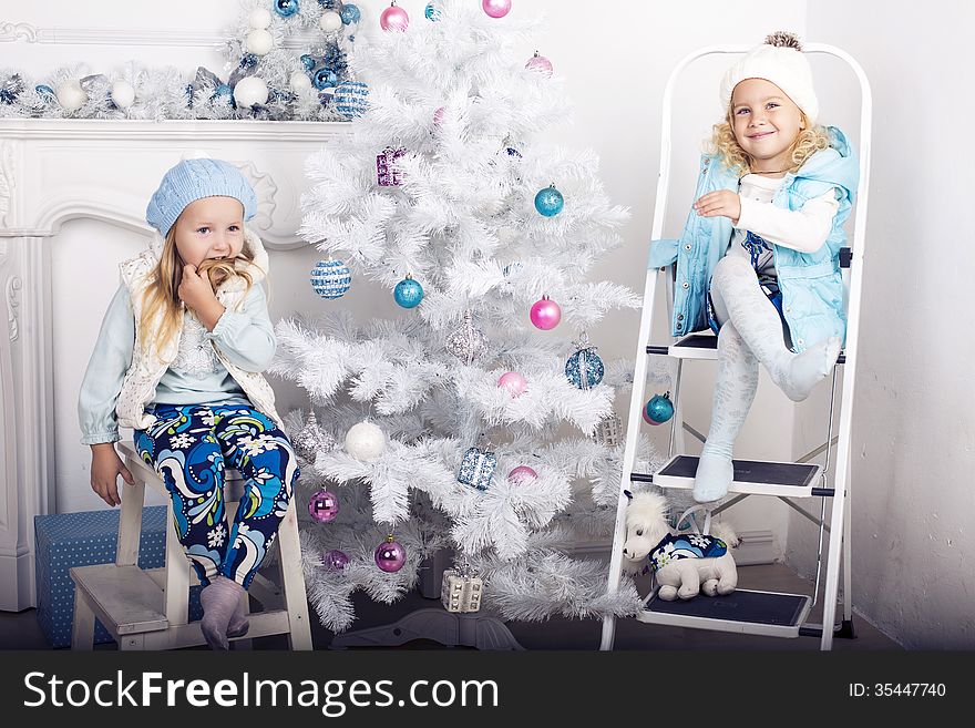Little funny girls with Cristmas Tree. Little funny girls with Cristmas Tree