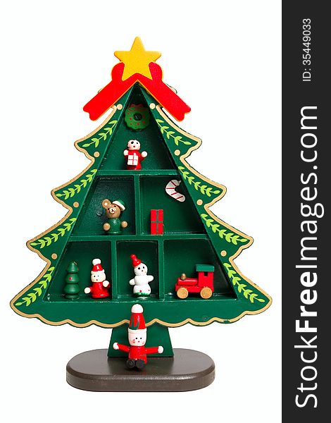 A miniature wooden christmas tree