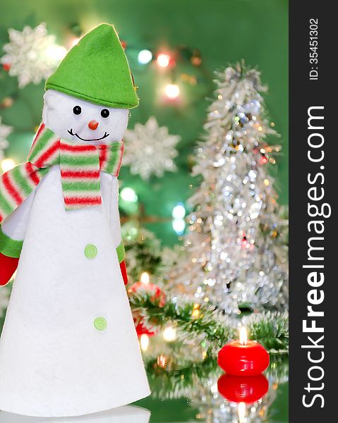 Christmas new year decoration with snowman and candles