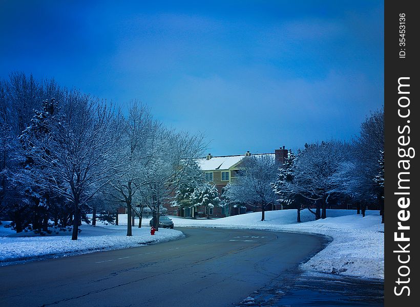 Winter landscape with road and snow covered trees