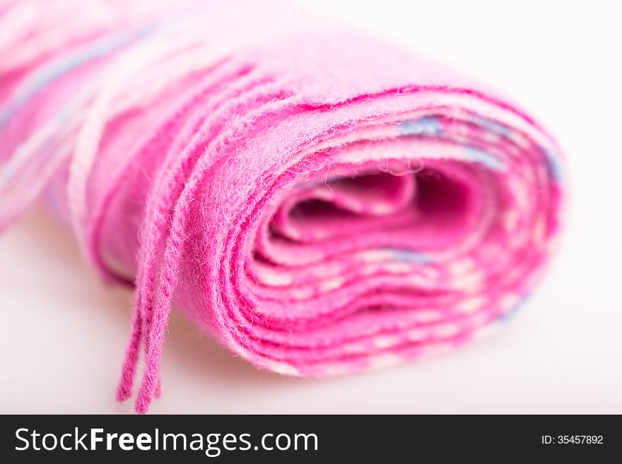 Woolen pink scarf close-up. Woolen pink scarf close-up