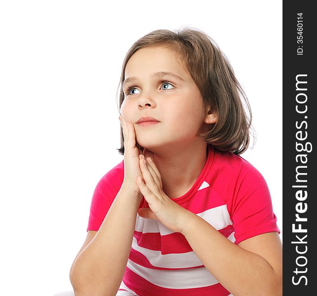 Portrait of a pretty little girl in red shirt on a white backgro