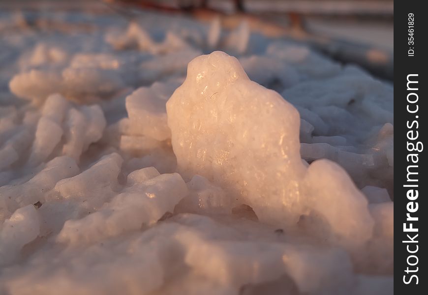 Giant salt crystals on the shore of the salt lake at sunset. Giant salt crystals on the shore of the salt lake at sunset