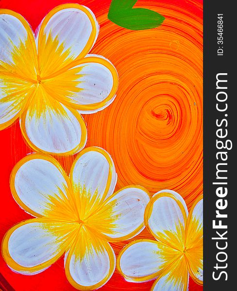 Frangipani flowers paint on orange background