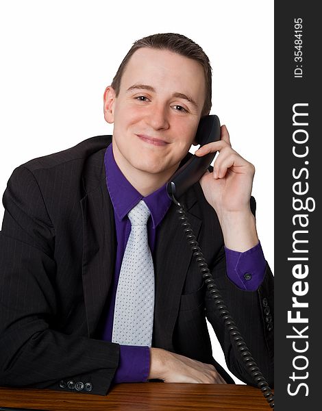 Friendly businessman on the phone - isolated
