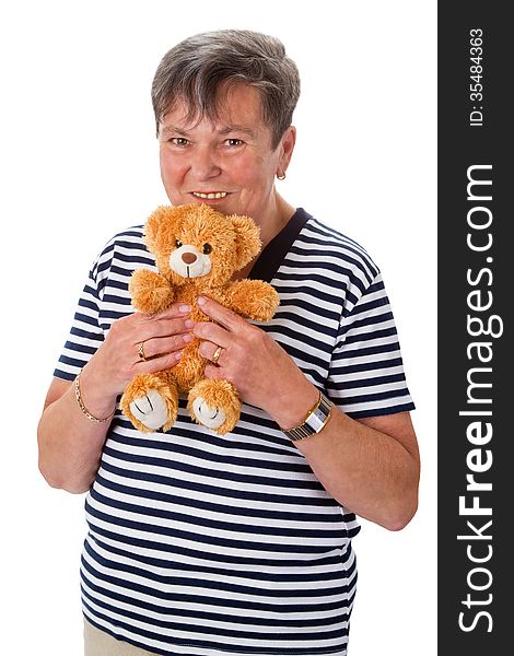 Senior woman with teddy bear - isolated