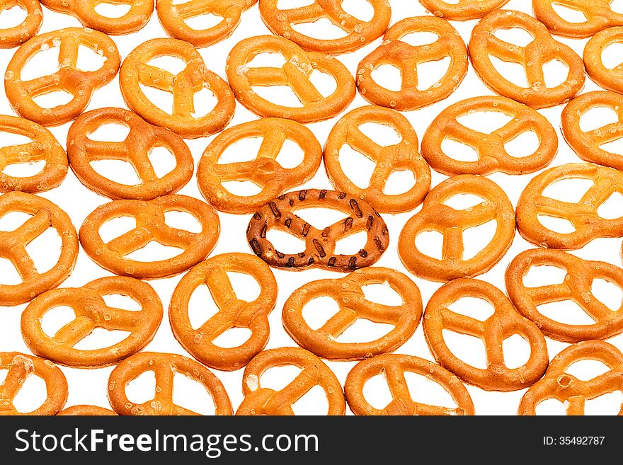 Pretzels isolated on a white background, all in focus, (wide DOF), with one pretzel up side down