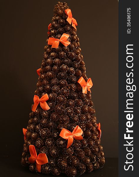 Christmas tree with cones - dark background