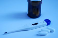 Thermometer And Pills. Stock Images Thermometer And Pills. Stock Images