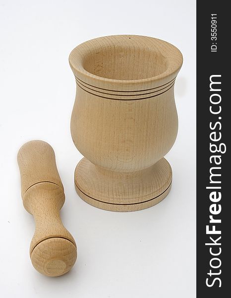 Wooden pestle on white background