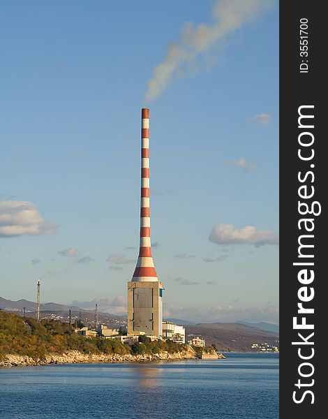 Hydroelectric power station and cloudy sky. Hydroelectric power station and cloudy sky