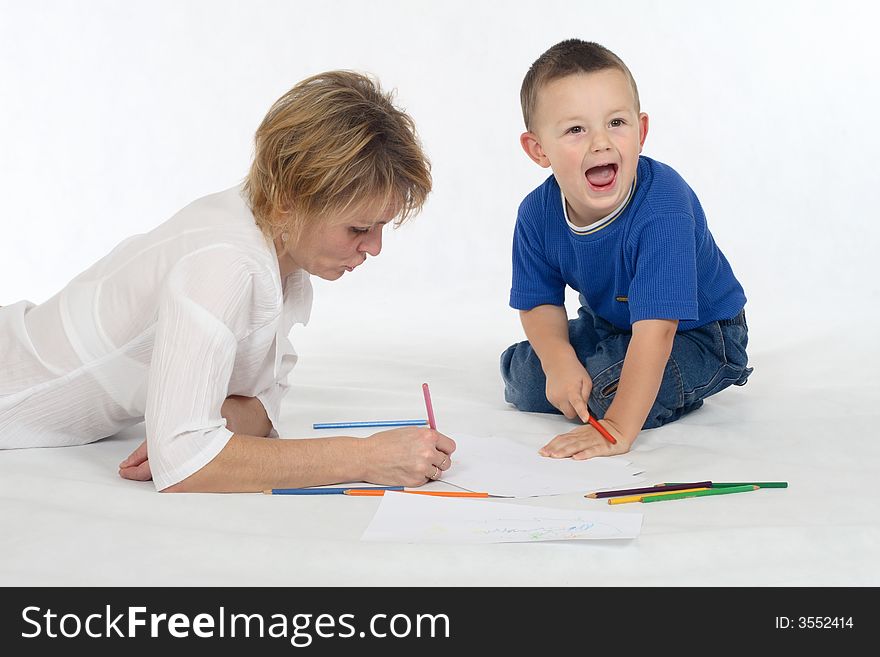 Woman and little boy drawing on the white background