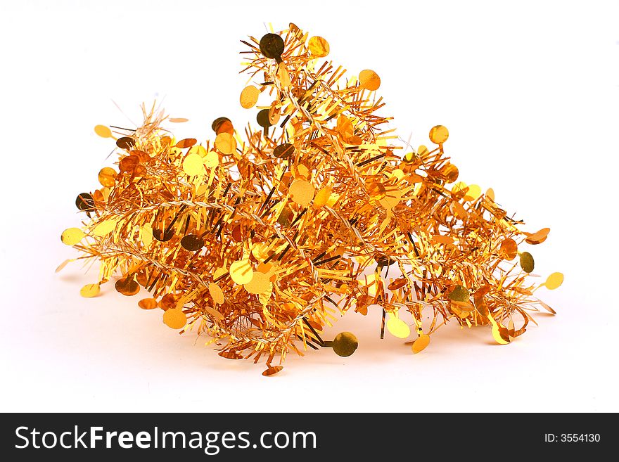 Bunch of gold spangles garland for the Christmas tree. Bunch of gold spangles garland for the Christmas tree