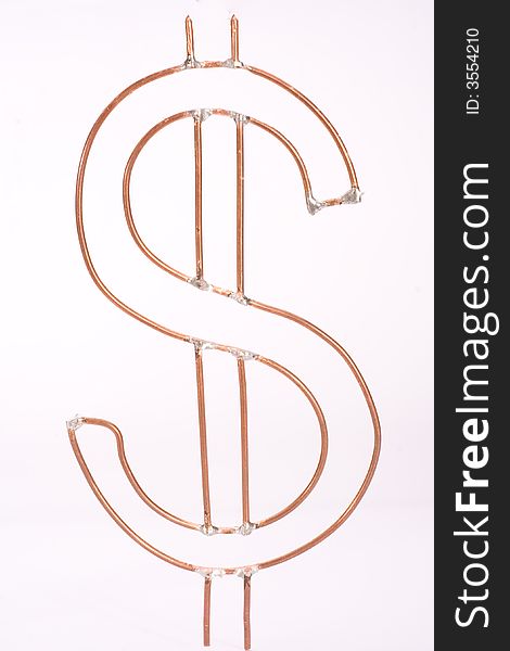 A copper dollar sign against white background. A copper dollar sign against white background