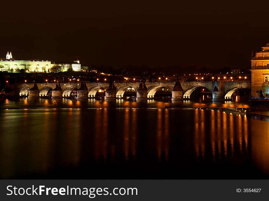 Night panorama of ancient bridge in old town