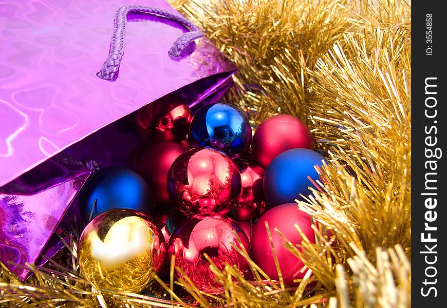 Christmas balls on golden background