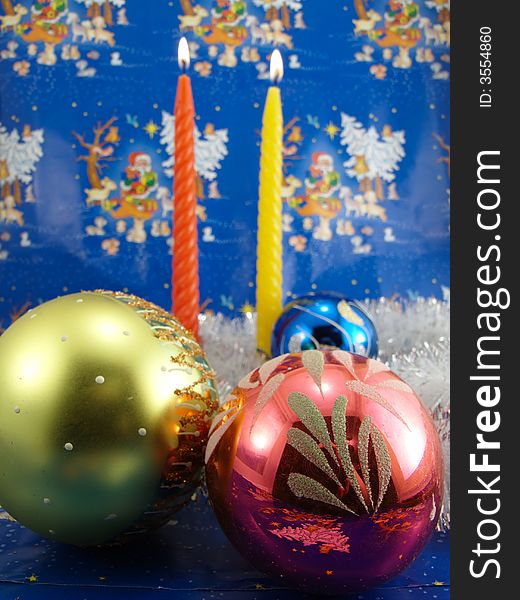 Candles and christmas balls (focus on balls)