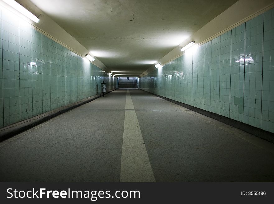 View of a subway with green faience on the wall