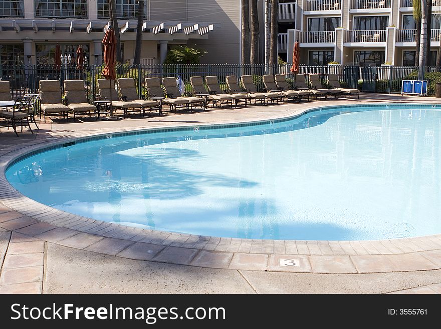 Hotel Pool With Chairs On The