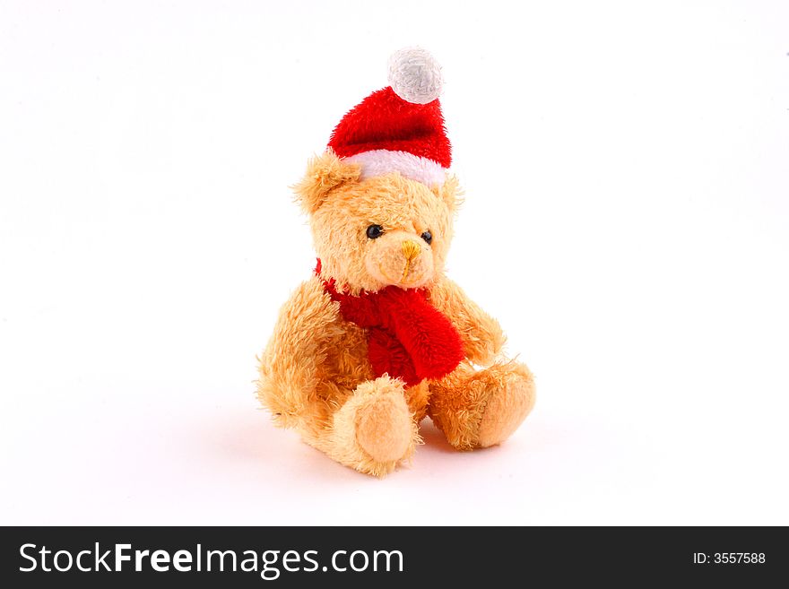 Teddy bear in a red santa suit. Teddy bear in a red santa suit