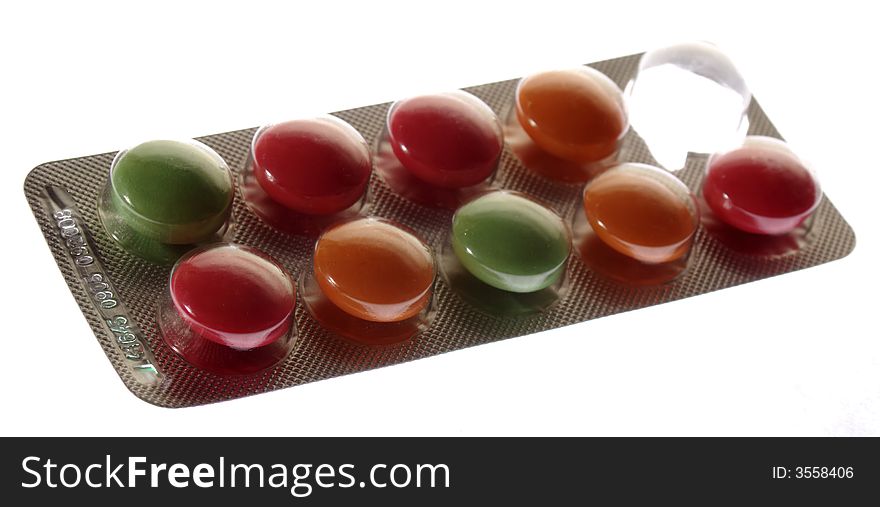 Tablets, pills color on a white background