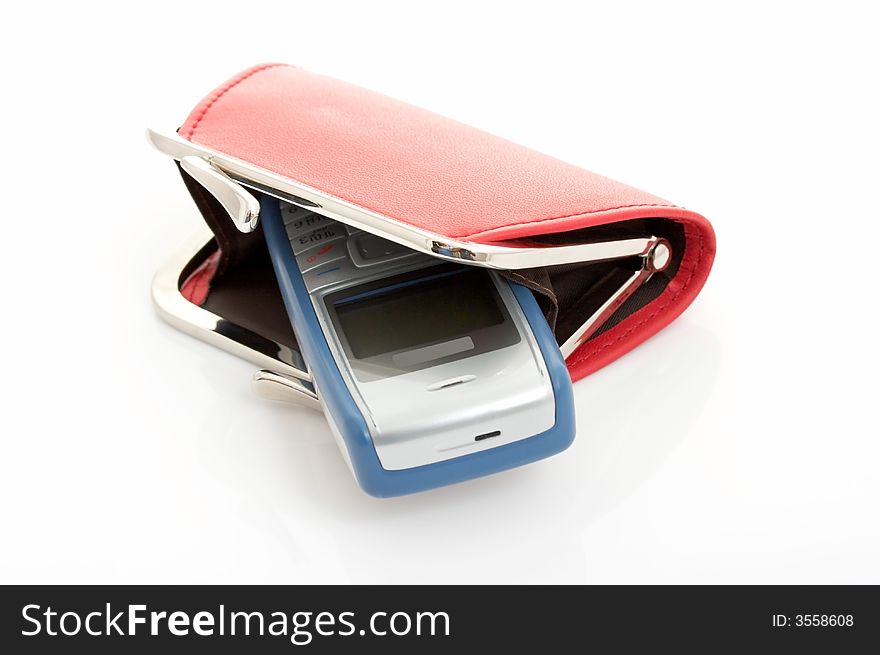A mobile phone inside a red wallet over a white background. A mobile phone inside a red wallet over a white background