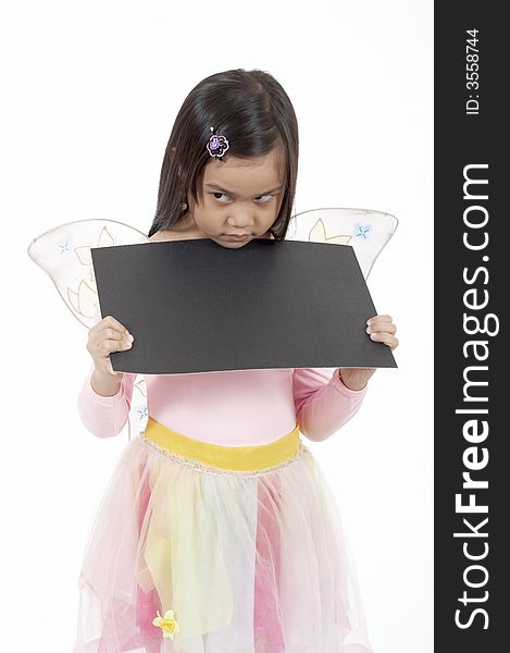 A girl holding a blank placard over a white background. A girl holding a blank placard over a white background