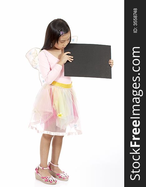 A girl holding a blank placard over a white background. A girl holding a blank placard over a white background