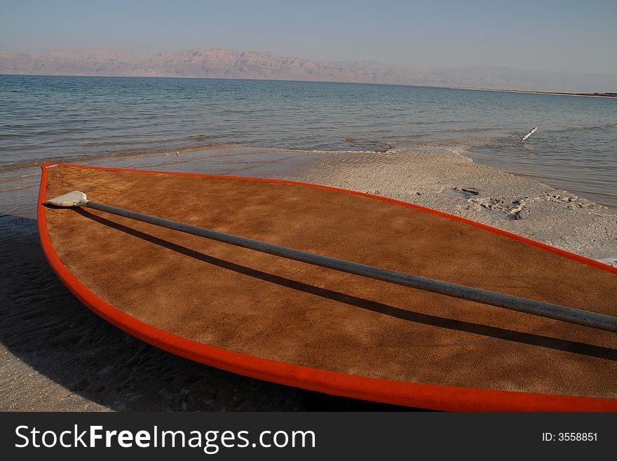 Boat on the shore of the Dead Sea
