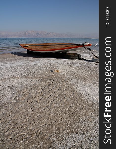 Boat on the shore of the Dead Sea