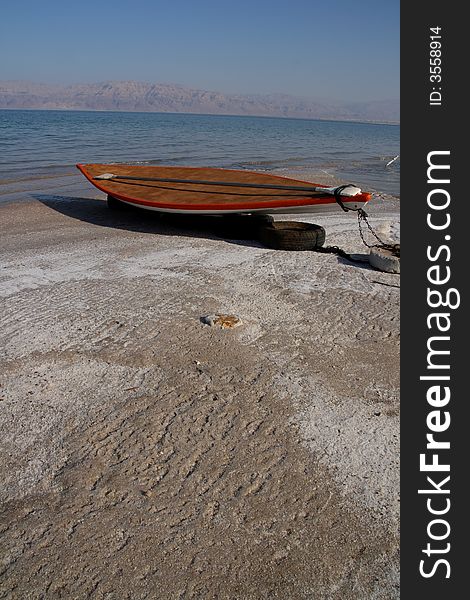Boat on the shore of the Dead Sea