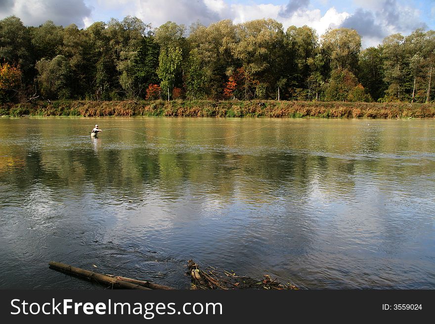 Fly fishing in autumn river. Fly fishing in autumn river