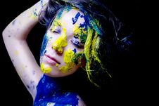 Beauty/fashion Portrait Of Woman Painted Blue And Yellow On Black Background Stock Photography Beauty/fashion Portrait Of Woman Painted Blue And Yellow On Black Background Stock Photography