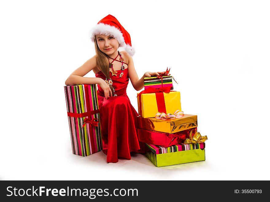 Christmas gifts and small girl Santa. Christmas gifts and small girl Santa
