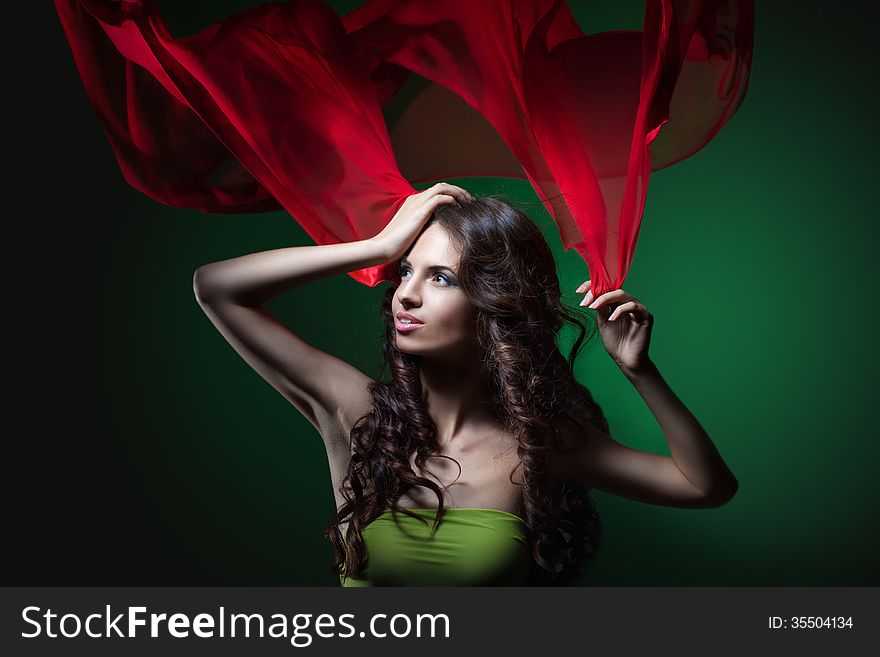 Long curly hair smiling girl with hands up. Long curly hair smiling girl with hands up