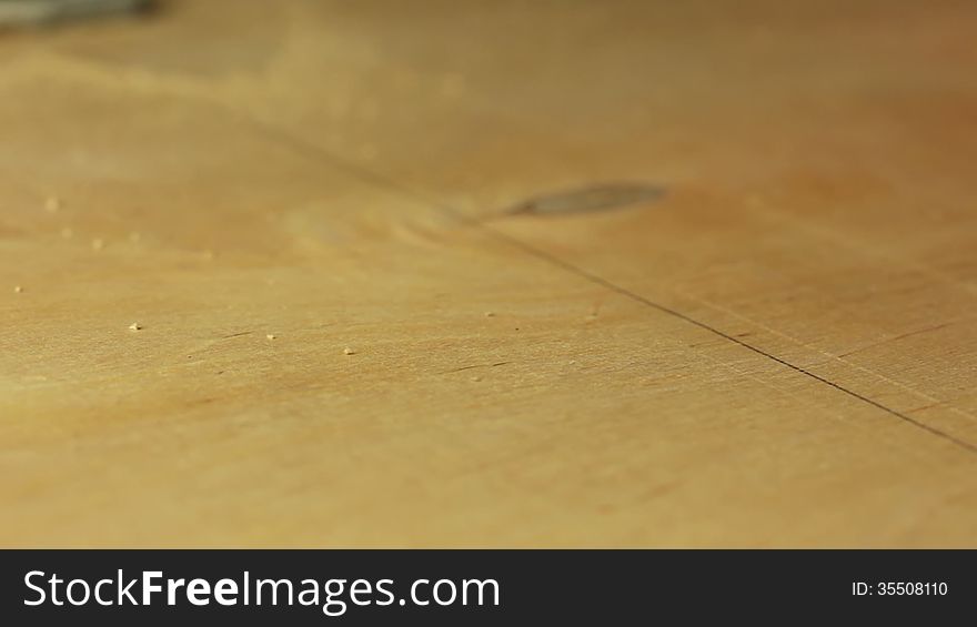 Electric fretsaw is sawing plywood. Close-up. Perspective view. Electric fretsaw is sawing plywood. Close-up. Perspective view