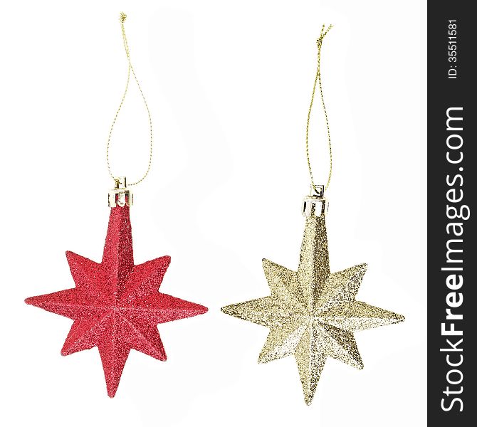 Gold and red eight pointed star christmas decoration for hanging on tree. Gold and red eight pointed star christmas decoration for hanging on tree